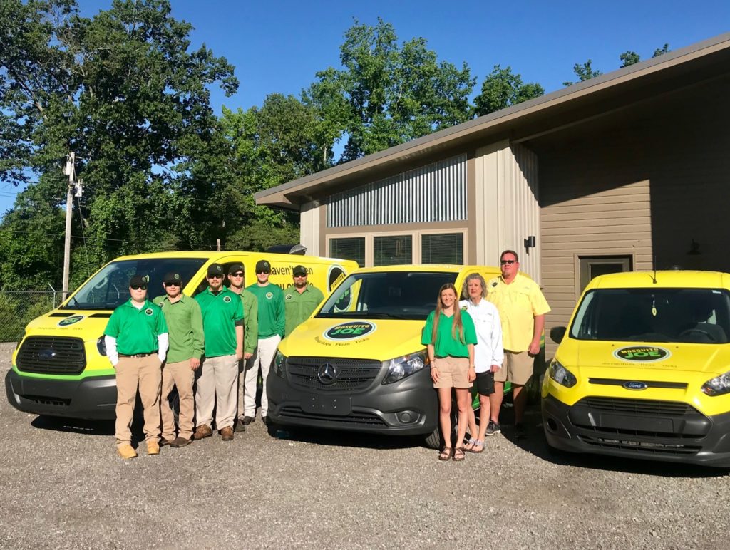 The Mosquito Joe of Huntsville-Birmingham team standing in front of their 3 transit vans. 